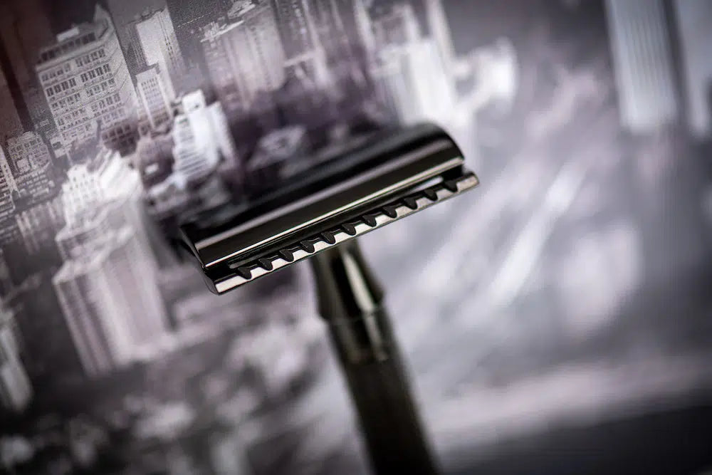 Safety razor on branded background