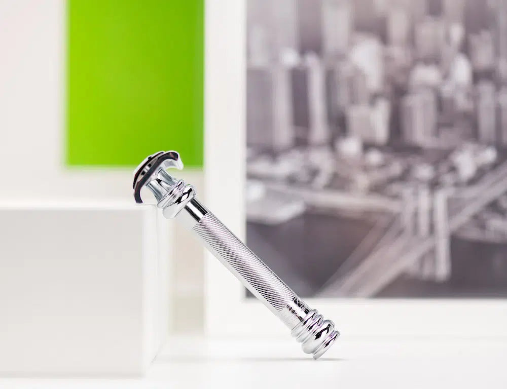 Safety razor on branded background