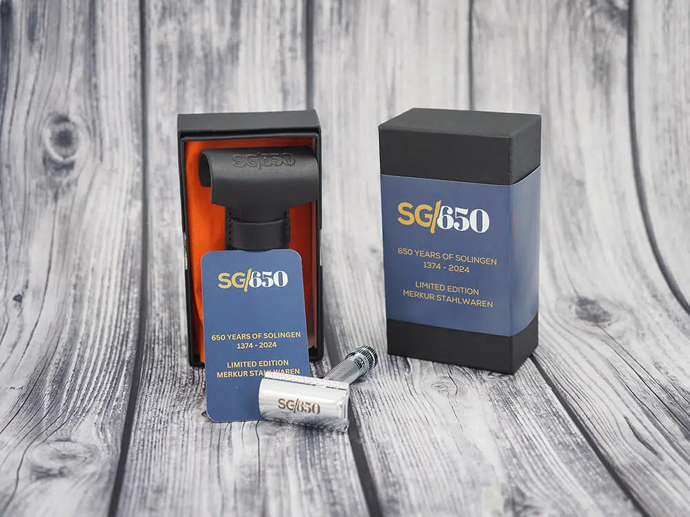 Safety razor on branded background