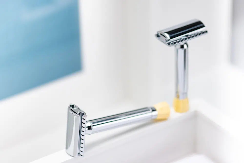 Safety razor on branded background
