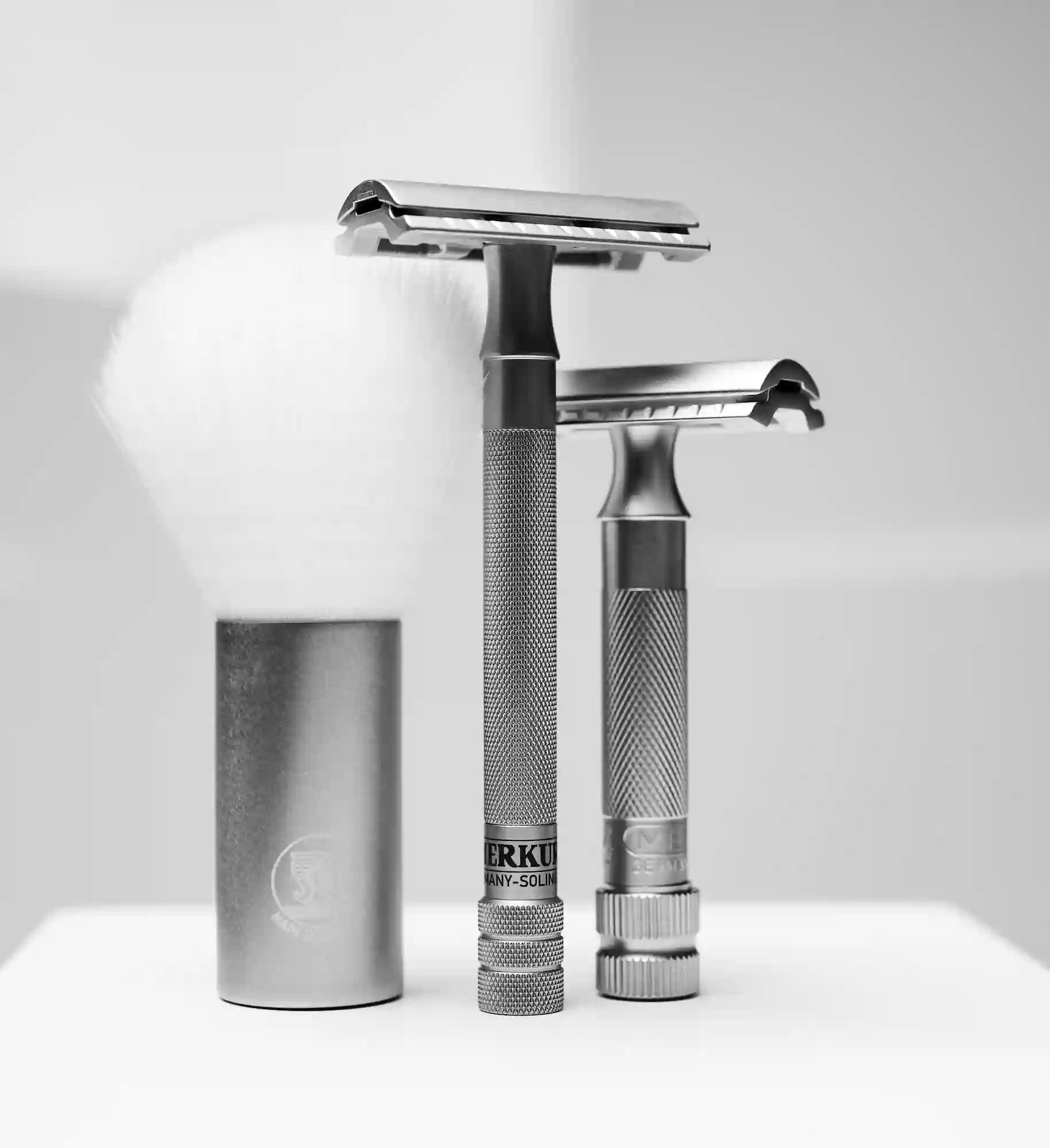 Safety razor on branded background
