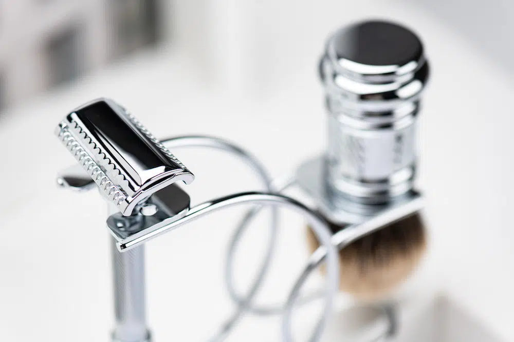 Safety razor on branded background