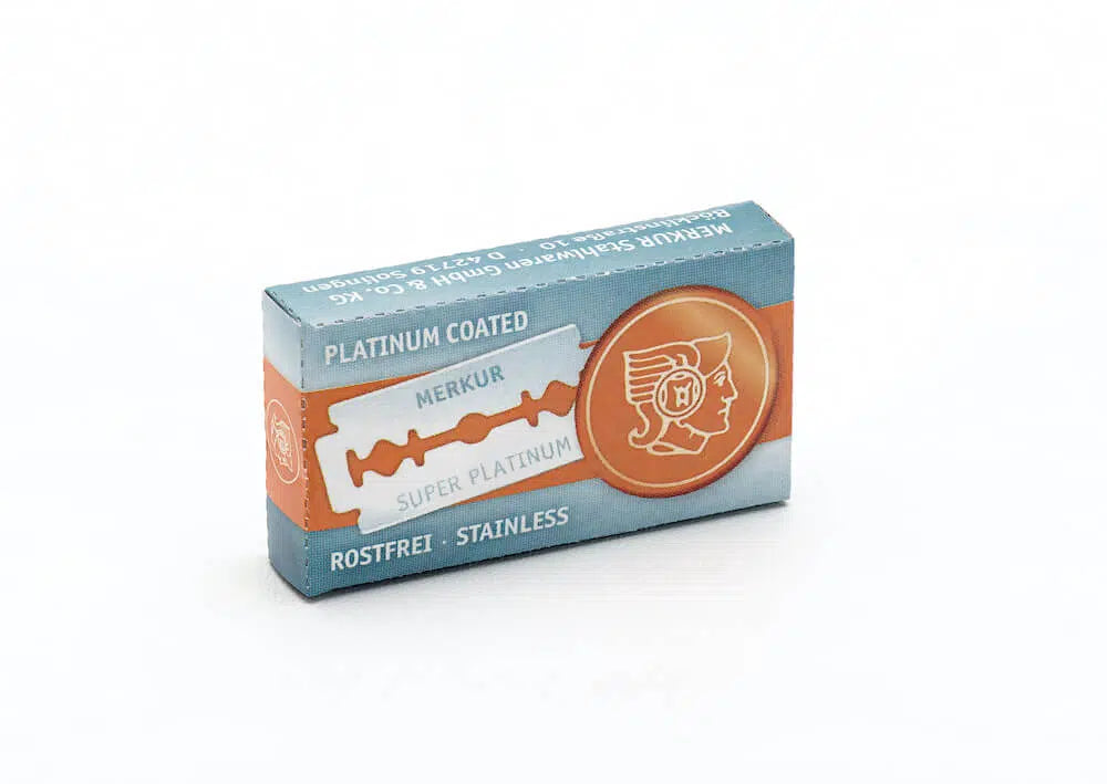 Safety razor on branded background